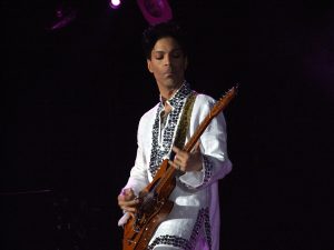 Prince playing guitar